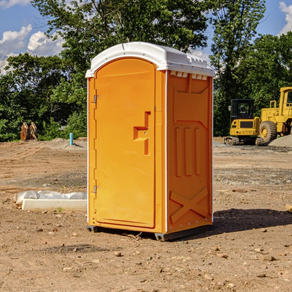 what is the cost difference between standard and deluxe portable restroom rentals in De Motte IN